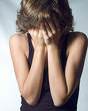 woman hiding face
