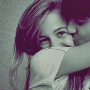 boy kissing girl