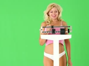 woman weighing herself