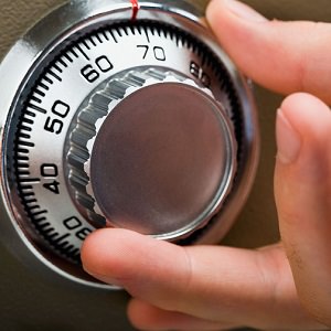 man opening safe